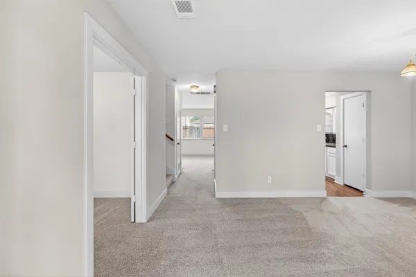 a view of a room with an empty space