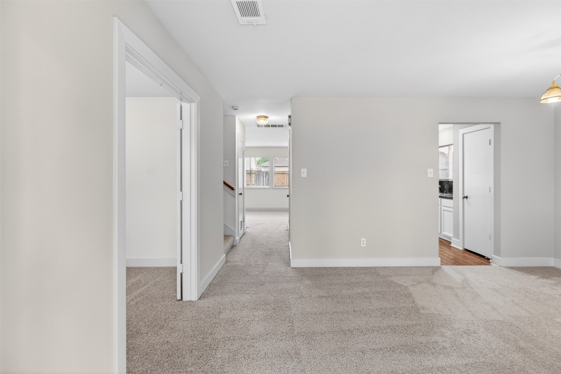 803 Dragonfly Drive Conroe, TX 77301 - Photo 4 of 50 a view of a room with an empty space