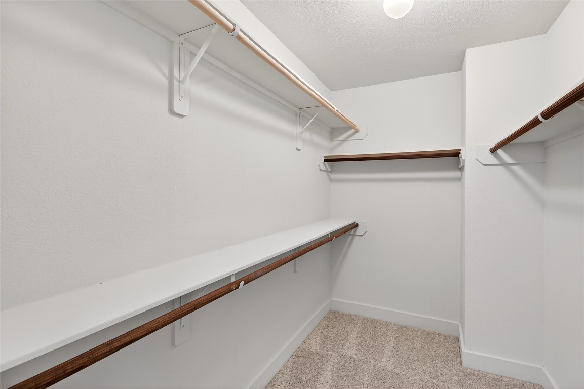 803 Dragonfly Drive Conroe, TX 77301 - Photo 42 of 50 a view of small space with racks on the wall