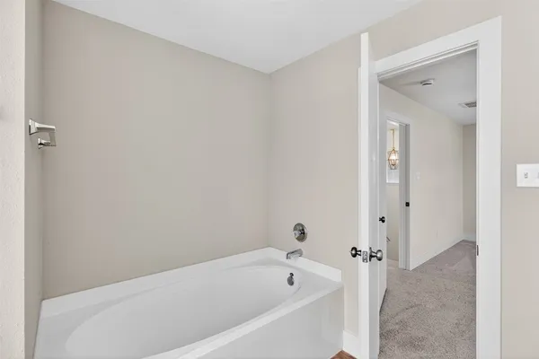 a bathroom with a sink and shower