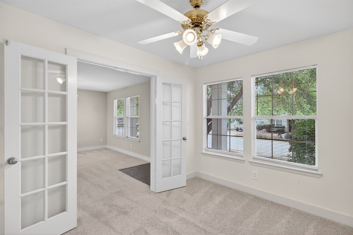 803 Dragonfly Drive Conroe, TX 77301 - Photo 10 of 50 a view of an empty room with a window