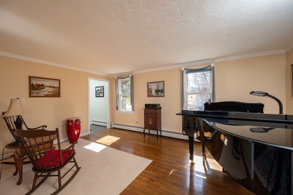 32 Old County Road Hingham, MA 02043 - Photo 14 of 38 a livingroom with furniture and a window