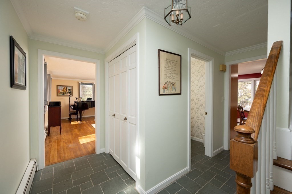 32 Old County Road Hingham, MA 02043 - Photo 15 of 38 a view of a livingroom with wooden floor and furniture