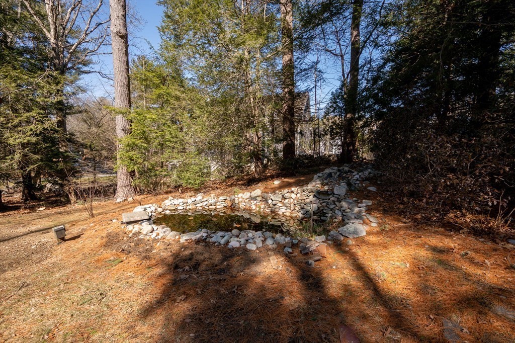 32 Old County Road Hingham, MA 02043 - Photo 31 of 38 a view of a yard with trees