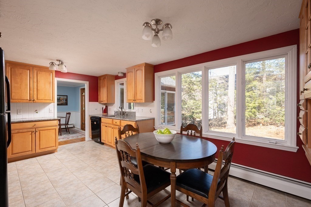 32 Old County Road Hingham, MA 02043 - Photo 5 of 38 a view of a dining room with furniture window and outside view