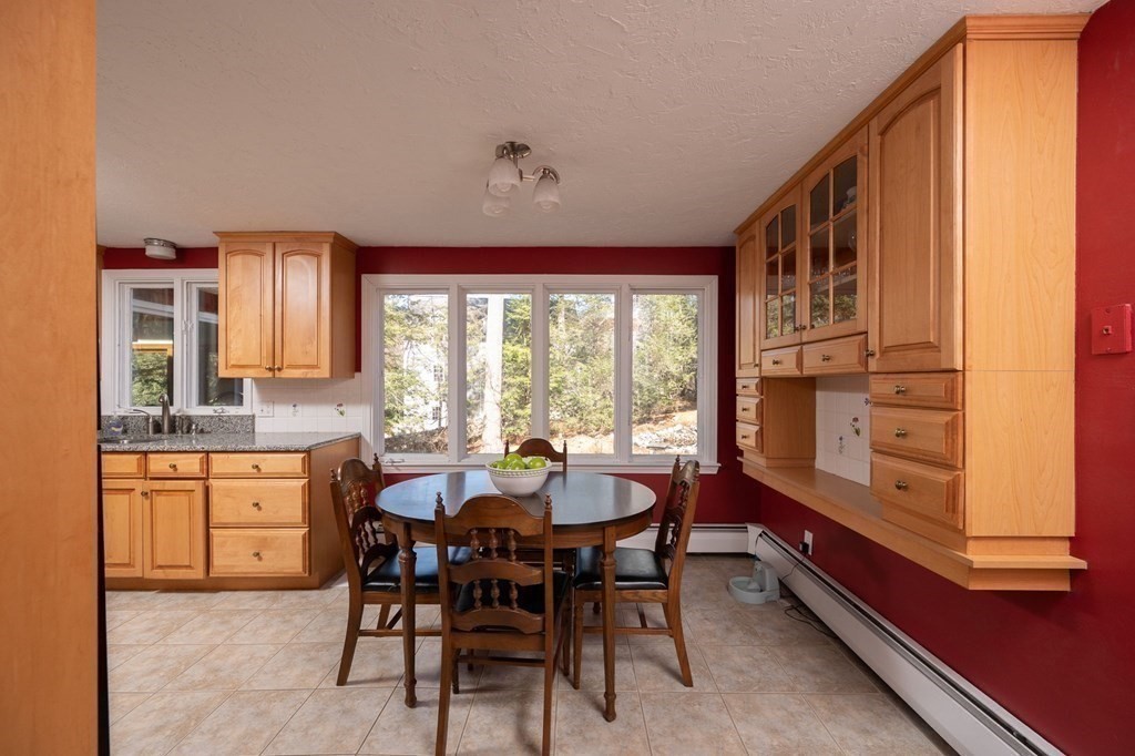 32 Old County Road Hingham, MA 02043 - Photo 8 of 38 a view of a dining room with furniture and window
