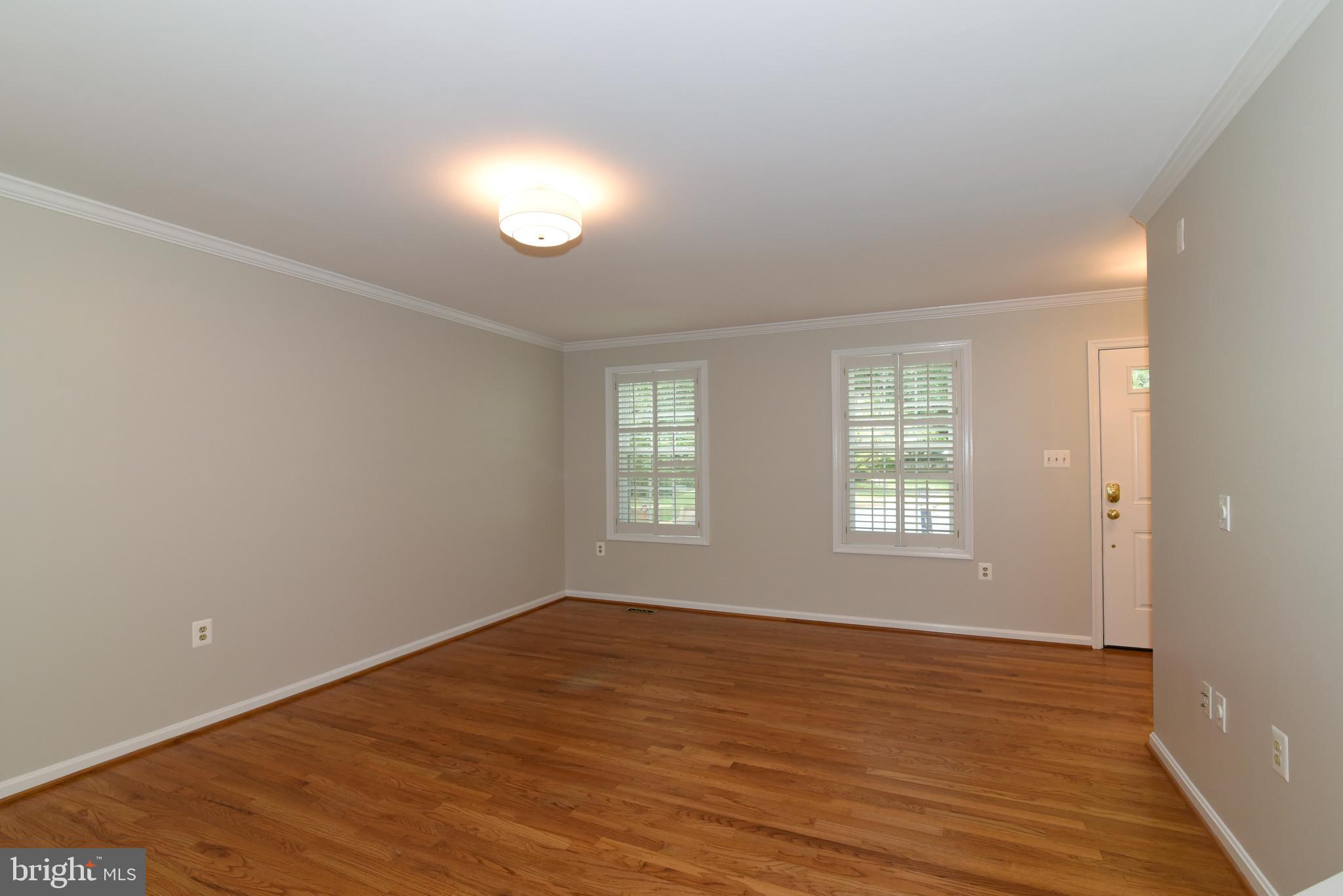 11940 Sentinel Point Court Reston, VA 20191 - Photo 8 of 43 A view from the Dining Room toward the Living Room