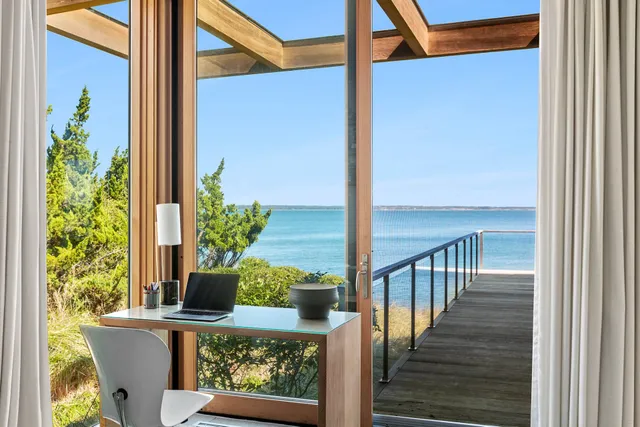 a view of balcony with furniture
