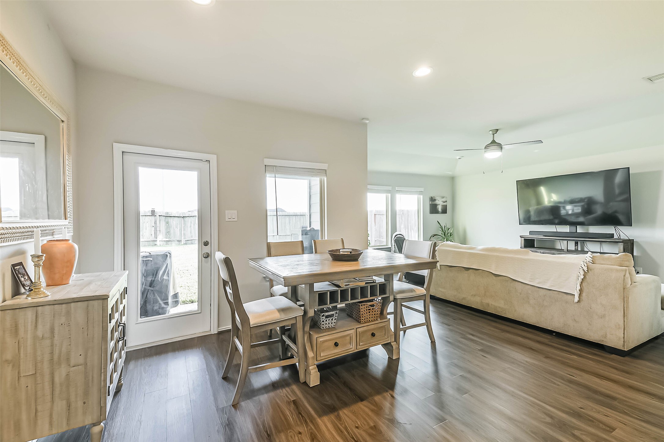 20342 Green Mountain Drive New Caney, TX 77357 - Photo 11 of 30 a living room with furniture and a flat screen tv