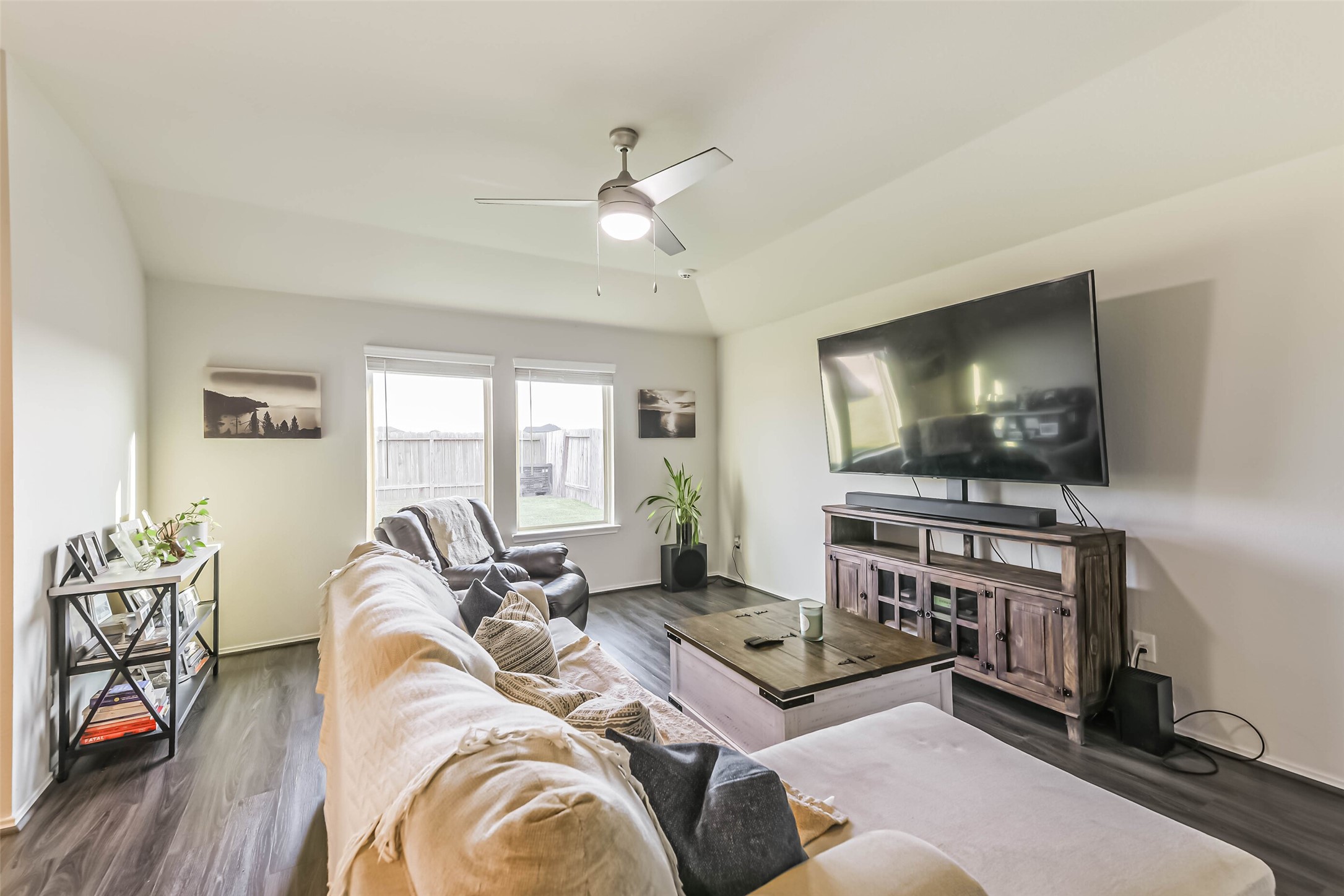 20342 Green Mountain Drive New Caney, TX 77357 - Photo 12 of 30 a living room with furniture and a flat screen tv