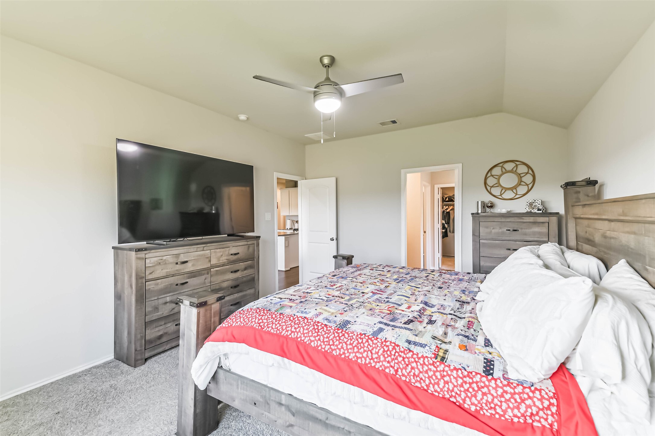 20342 Green Mountain Drive New Caney, TX 77357 - Photo 16 of 30 a bedroom with a bed and a flat screen tv