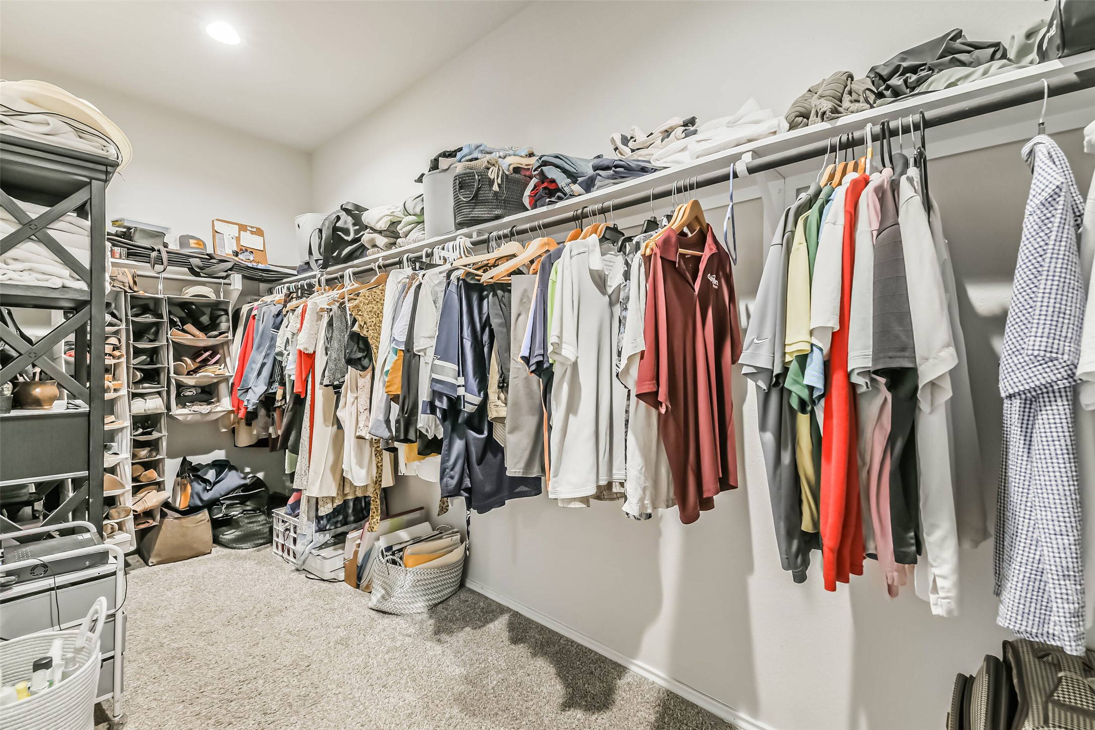 20342 Green Mountain Drive New Caney, TX 77357 - Photo 20 of 30 a view of walk in closet with clothes