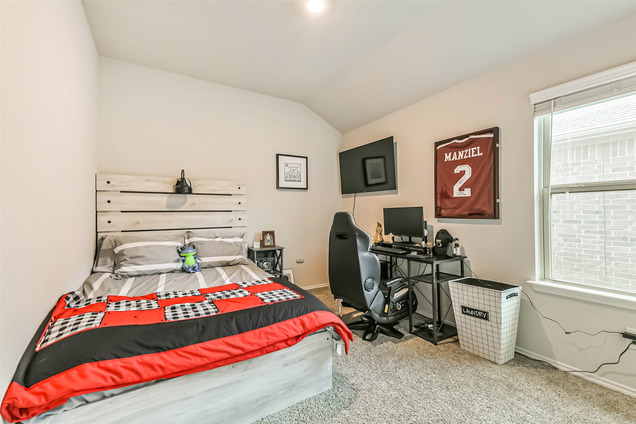 20342 Green Mountain Drive New Caney, TX 77357 - Photo 22 of 30 a bedroom with a bed and furniture