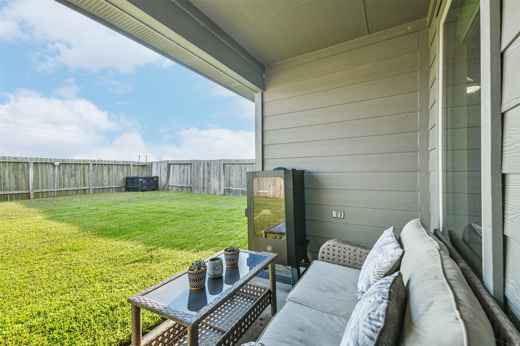 20342 Green Mountain Drive New Caney, TX 77357 - Photo 30 of 30 a view of a patio with a yard