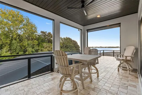 a view of an outdoor dining space with furniture