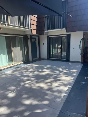 a front view of a house with a porch