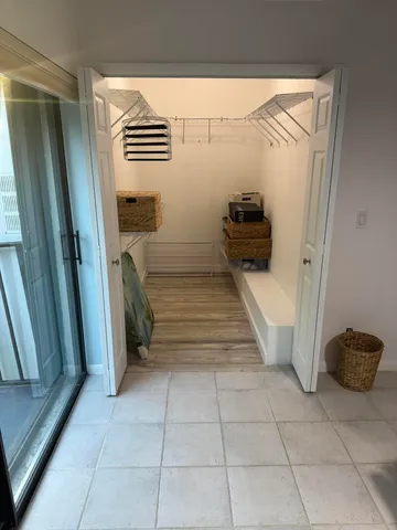 a bed room with a bed and television