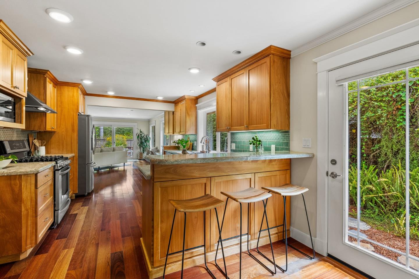 555 Risso Court Santa Cruz, CA 95062 - Photo 15 of 61 a dining room with stainless steel appliances granite countertop furniture and a large window