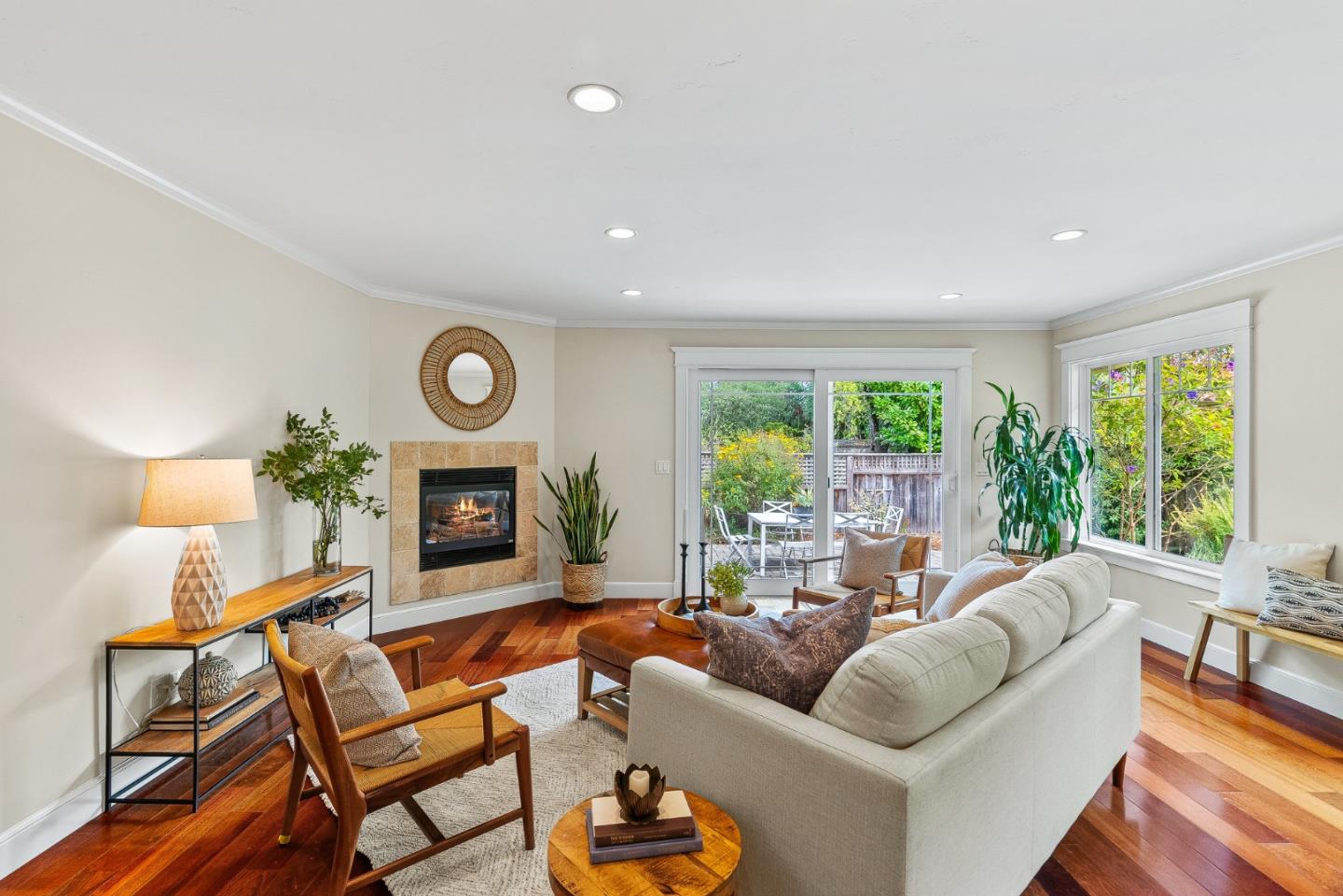 555 Risso Court Santa Cruz, CA 95062 - Photo 21 of 61 a living room with furniture a fireplace and a window