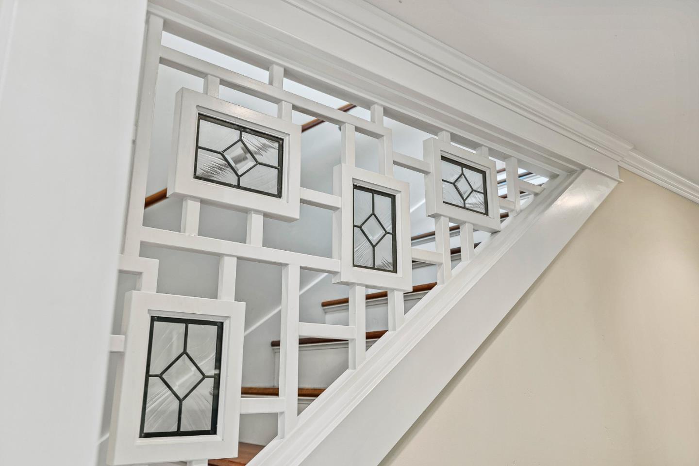 555 Risso Court Santa Cruz, CA 95062 - Photo 29 of 61 a view of staircase with white walls and a window