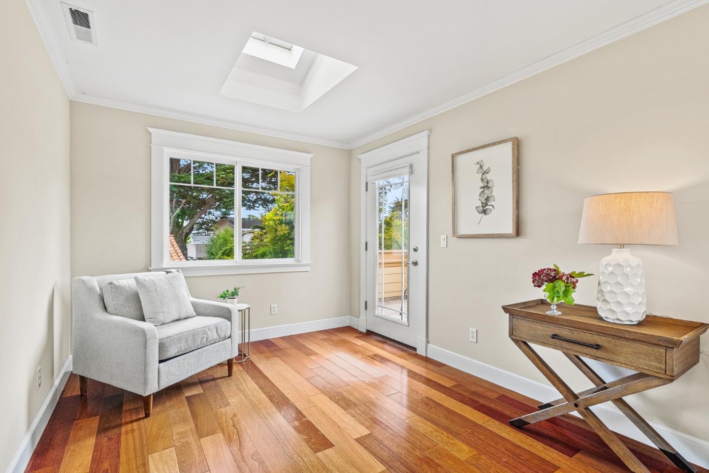 555 Risso Court Santa Cruz, CA 95062 - Photo 36 of 61 a living room with furniture and a wooden floor