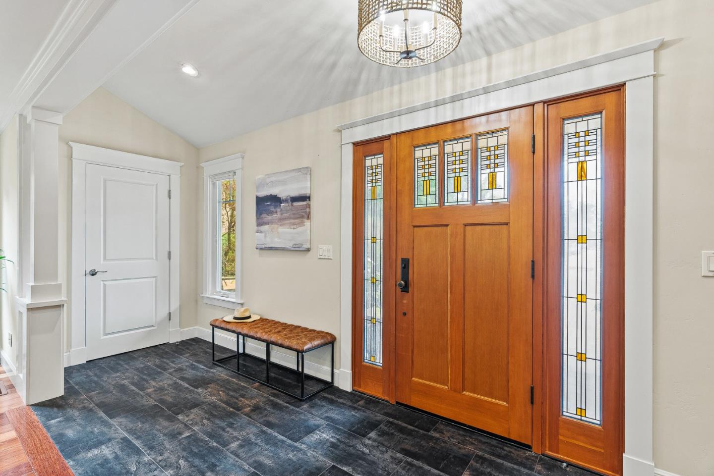 555 Risso Court Santa Cruz, CA 95062 - Photo 4 of 61 a living room with a bed and wooden floor