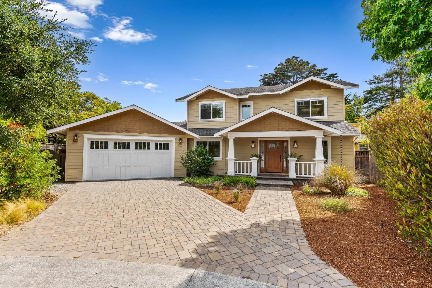 555 Risso Court Santa Cruz, CA 95062 - Photo 57 of 61 a front view of a house with a yard and garage