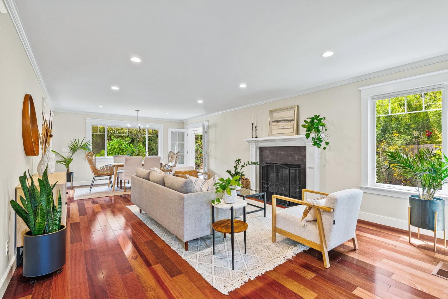 555 Risso Court Santa Cruz, CA 95062 - Photo 6 of 61 a living room with furniture a fireplace and a potted plant