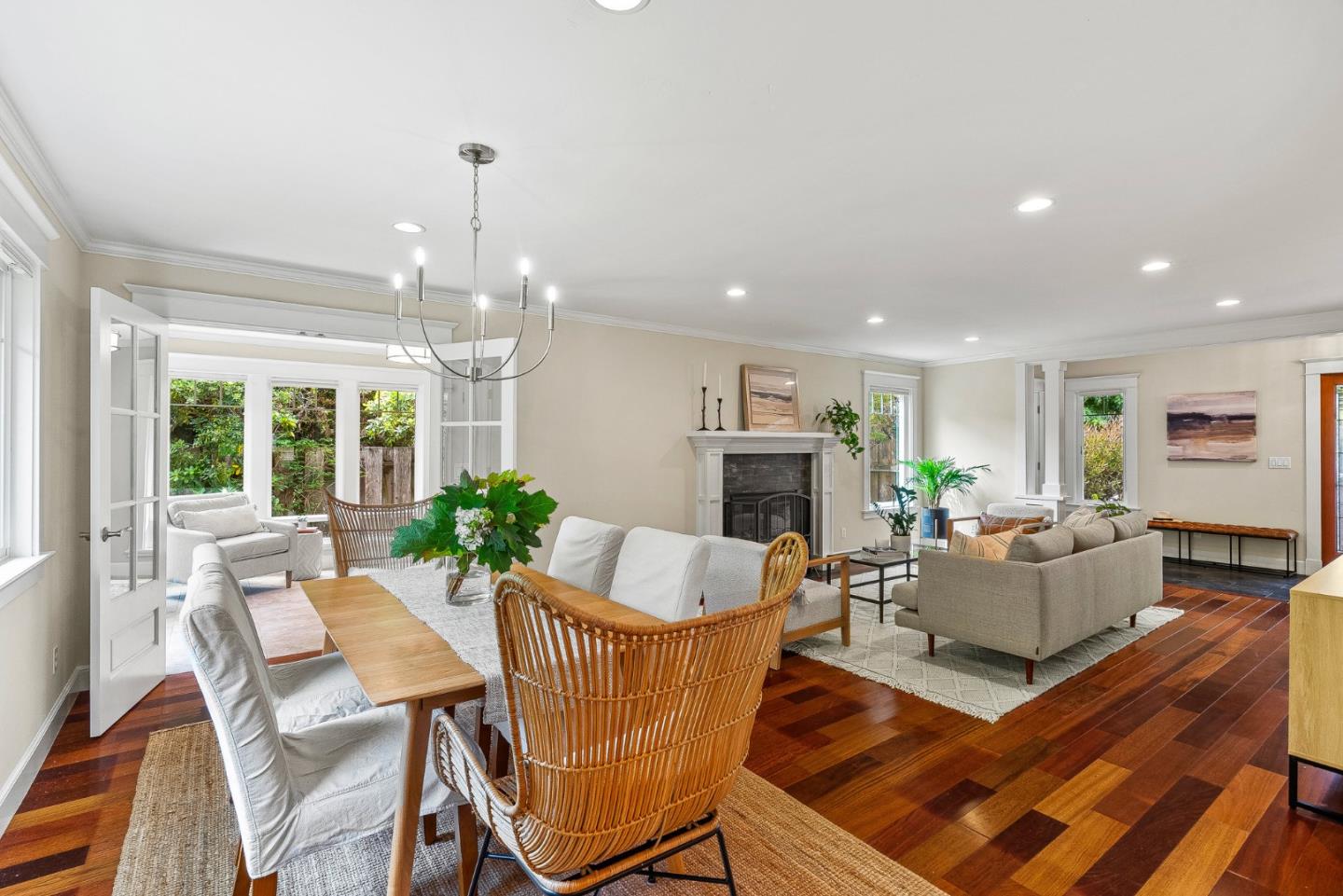 555 Risso Court Santa Cruz, CA 95062 - Photo 10 of 61 a living room with fireplace furniture and a chandelier