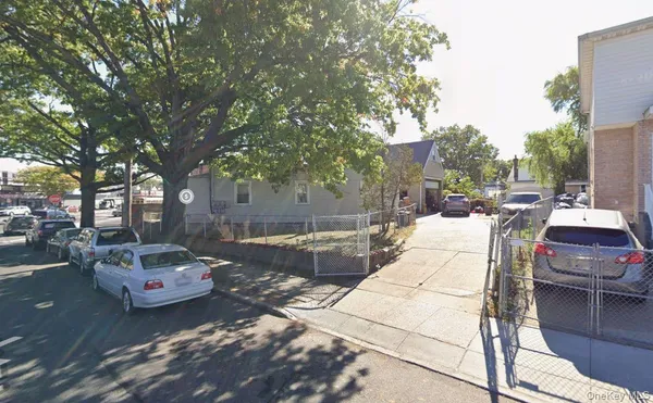 a couple of cars parked in a parking lot