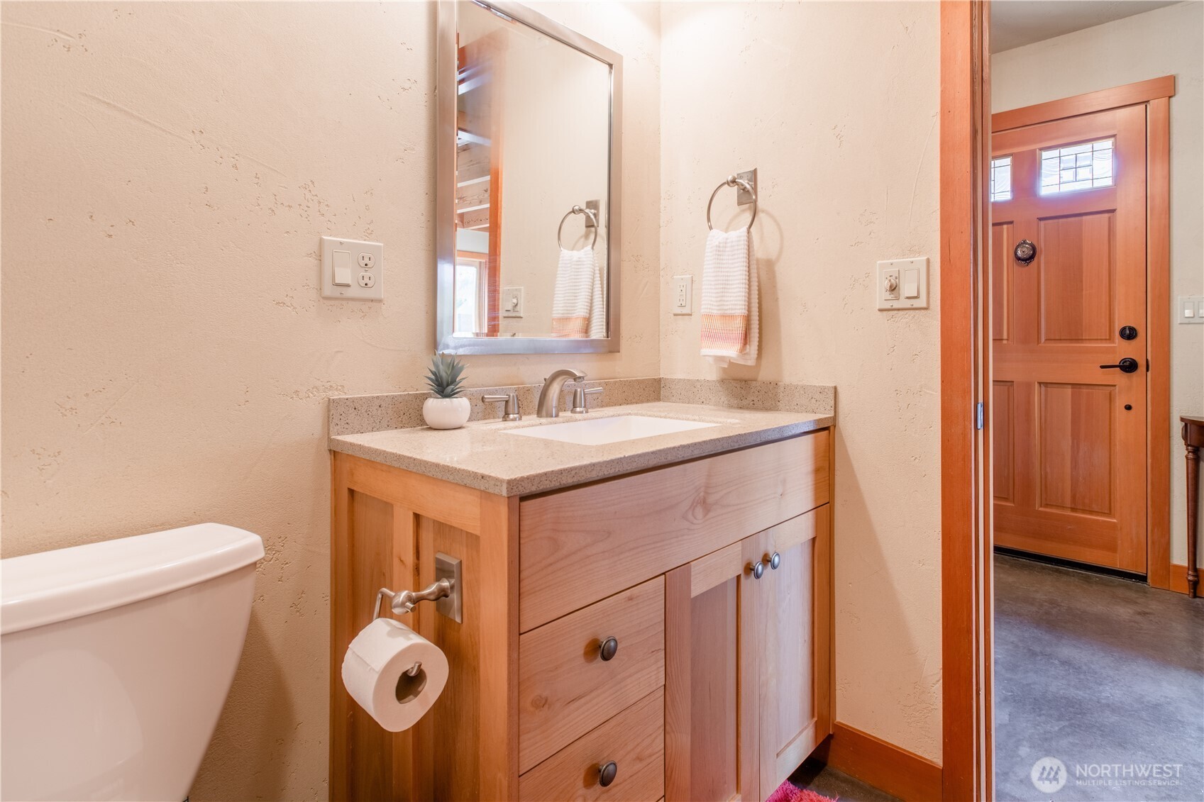 2516 Mill Avenue Bellingham, WA 98225 - Photo 13 of 36 a bathroom with a sink and a toilet