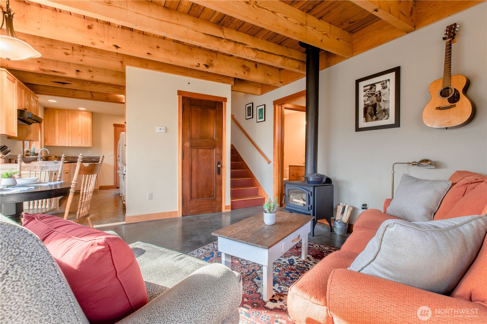 2516 Mill Avenue Bellingham, WA 98225 - Photo 3 of 36 a living room with furniture a rug and white walls