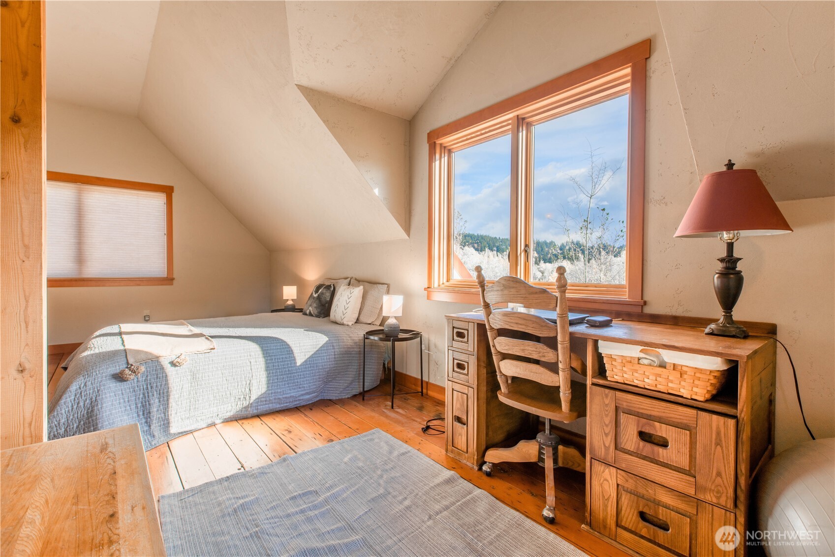 2516 Mill Avenue Bellingham, WA 98225 - Photo 9 of 36 a bed room with a bed and a window