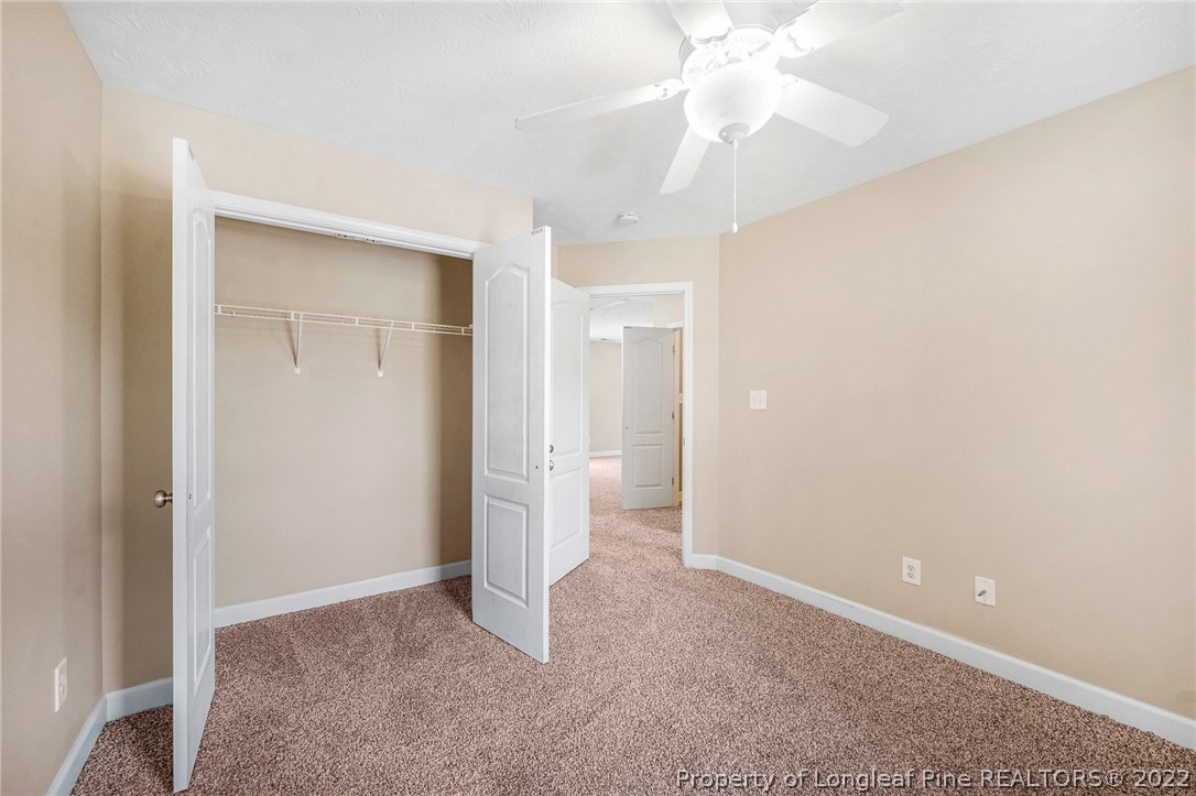 2673 Rockfish Road Raeford, NC 28376 - Photo 33 of 42 wooden floor in an empty room with a bathroom
