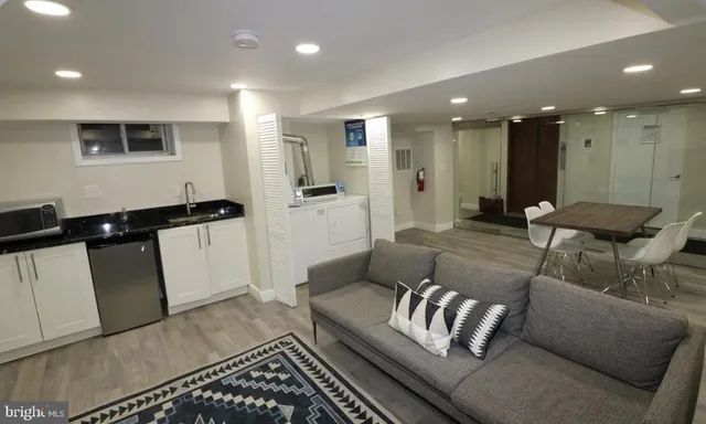 a living room with couch and a table