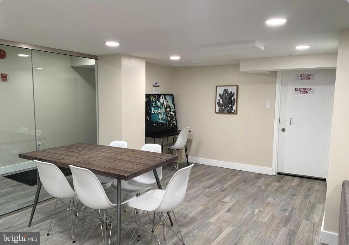 1125 12th Street Northwest, Unit 64 Washington, DC 20005 - Photo 35 of 42 a view of a dining room with furniture