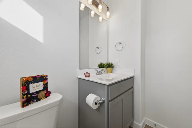 a room with cabinets and wooden floor