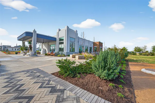 a view of a street with houses