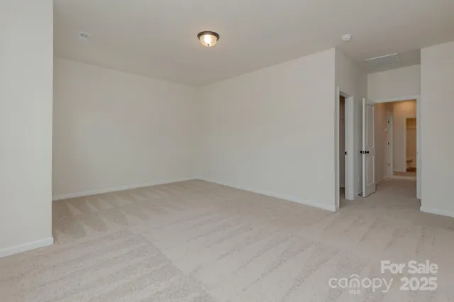a bathroom with a shower and sink