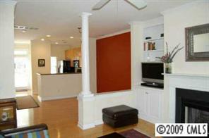 3444 Stettler View Road, Unit 225 Charlotte, NC 28210 - Photo 4 of 8 a living room with furniture and a fireplace