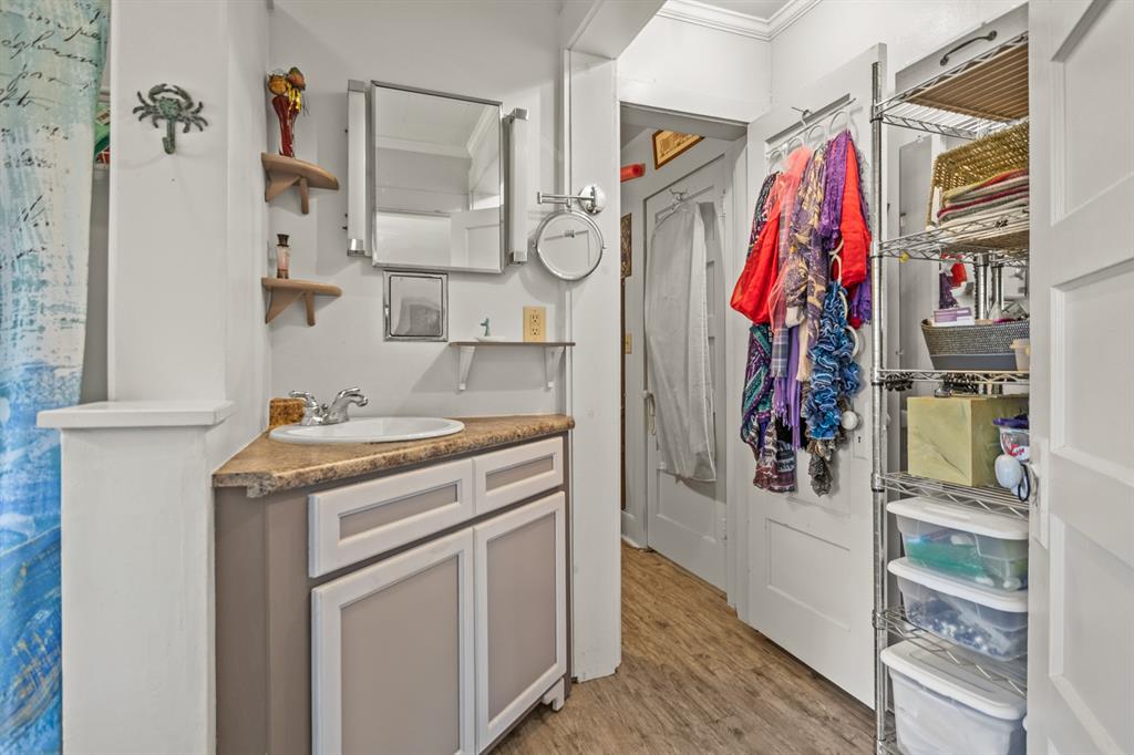 103 South Sun Camp Road White Oak, TX 75693 - Photo 31 of 40 a view of walk in closet with clothes shoes and a mirror