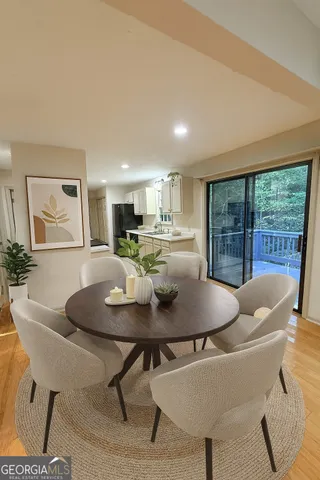 a living room with furniture and a table