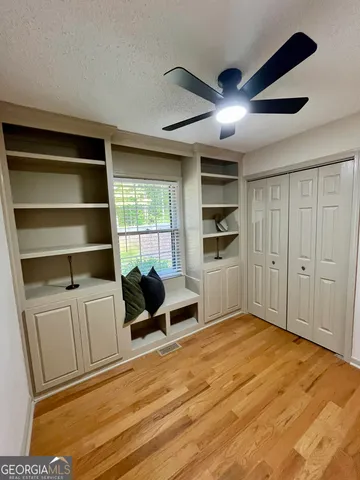 a room with furniture and a window