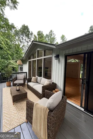 a view of living room couch and a window