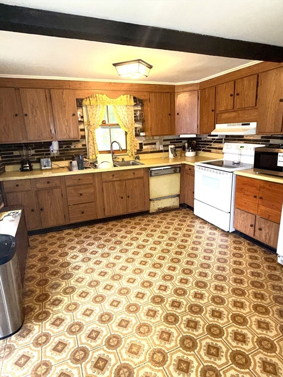 87 Ashfield Road Conway, MA 01341 - Photo 11 of 38 a large kitchen with stainless steel appliances a stove a sink and a refrigerator