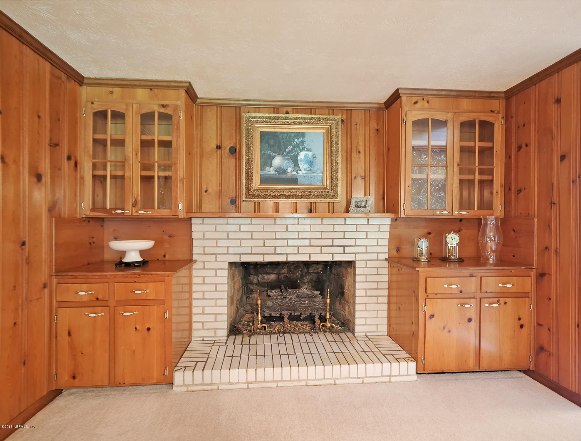 4819 Lannie Road Jacksonville, FL 32218 - Photo 4 of 50 04 natural wood built-ins & fireplace