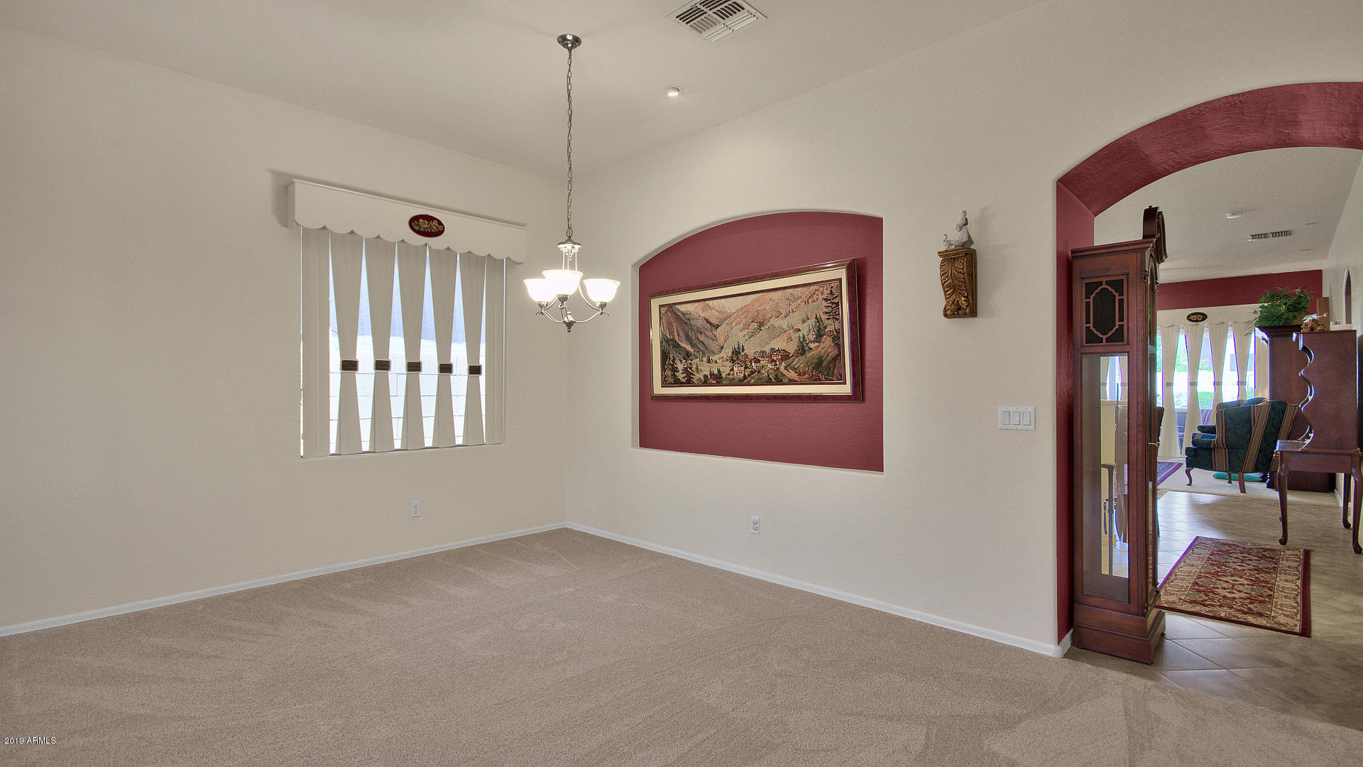5522 West Carson Road Laveen, AZ 85339 - Photo 6 of 32 a view of livingroom with hardwood floor and ceiling fan