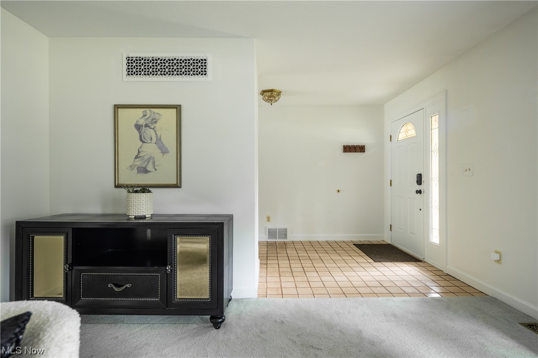 868 Trebisky Road Cleveland, OH 44121 - Photo 3 of 35 View of tiled foyer & Living Room