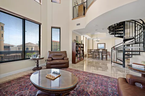 a living room with furniture or couch and a wooden floor