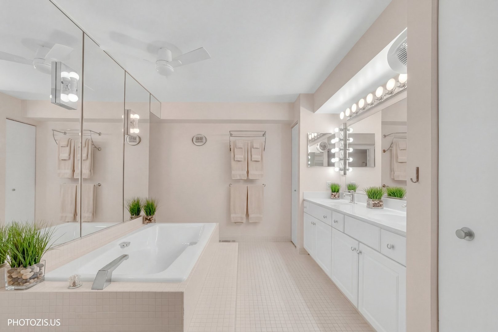 1621 Mission Hills Road, Unit 108 Northbrook, IL 60062 - Photo 10 of 22 a spacious bathroom with a double vanity sink and a shower